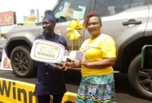 Ms Kotei-Walsh presenting an award to one of the winners
