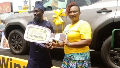 Ms Kotei-Walsh presenting an award to one of the winners