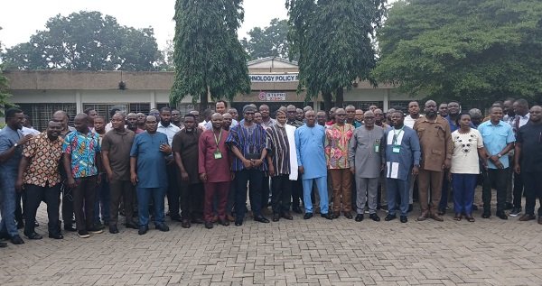 Naa Abu (middle) with directors of Survey, Mapping and other participants at the programme