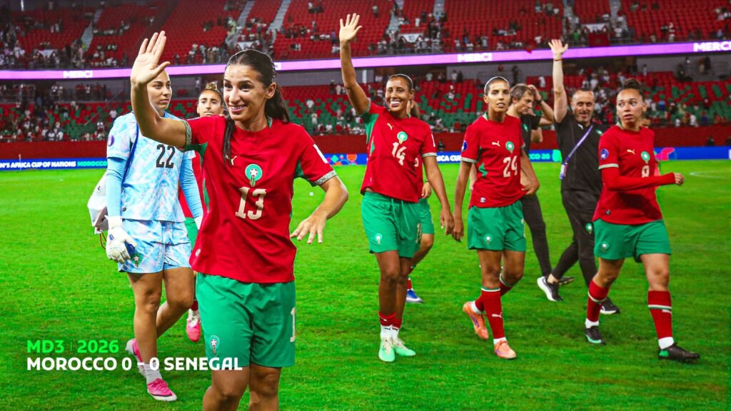 Moroccan players celebrating their qualification