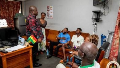 Mr Gunu interacting with some of the athletes and other officials