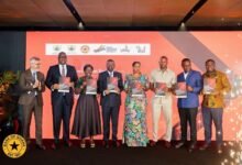 Mrs Elizabeth Ofosu-Agyare (third from left), Dr. Asiama (fifth from right), Mr Madjie (second from left) and other dignitaries launching the report