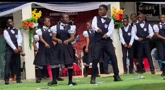 Students of New Vision Montessori School dancing at the graduation ceremony.