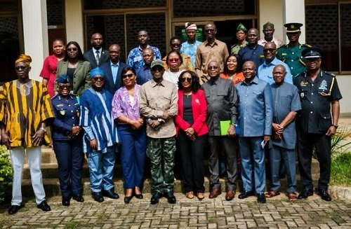 Mr Mburidiba and Dr Graham with other participants after the meeting