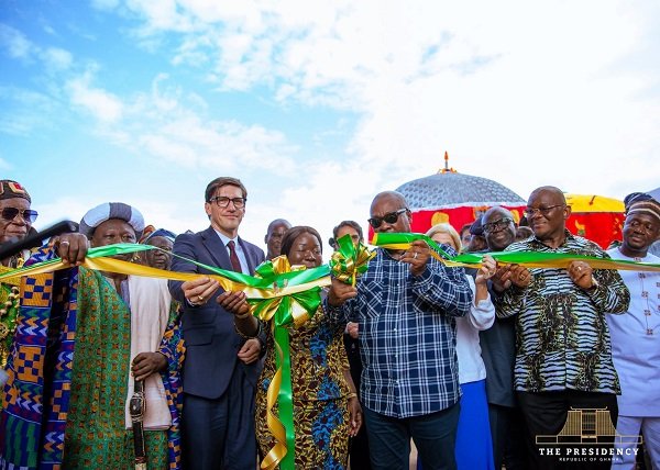 President Mahama (third from right) supported by other dignitaries to cut the tape to inaugurate the Northshore Apparel Ghana Limited facility at Savelugu