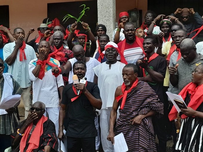 Mr Otu Zor (front row middle) addressing the media