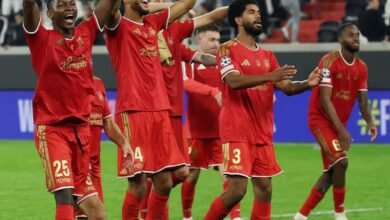 Players of LASK celebrate their qualification