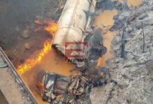 A fuel tanker engulfed in flames