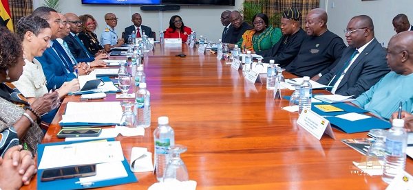 President Mahama (arrowed) with Jamaican officials during a meeting in Kingston, Jamaica