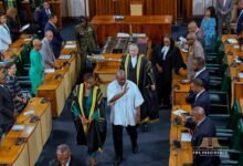 President Mahama (middle in smock) leaving the chamber after addressing a joint sitting of the Jamaican Parliament