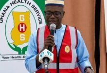 Mr Mburidiba (inset) addressing the gathering