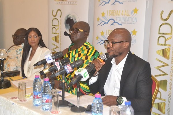 Mr Odunowo (right) speaking at the event. With him are Mrs Weisinger (second from left) and Nana Dr Agyenim Boateng I (middle) Photo Victor A. Buxton