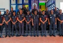The promoted officers with their heads