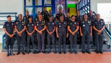 The promoted officers with their heads