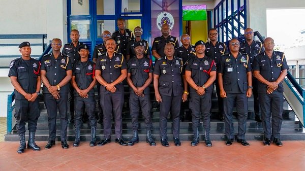 The promoted officers with their heads