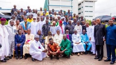 Mr Yohonu (seated third from right) with religious leaders after the engagement
