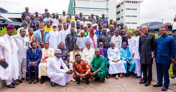 Mr Yohonu (seated third from right) with religious leaders after the engagement