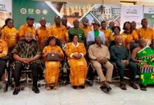Mrs Houadjeto (seated middle) with Mr Abraham Amaliba (seated third from right) and other stakeholders after the launch