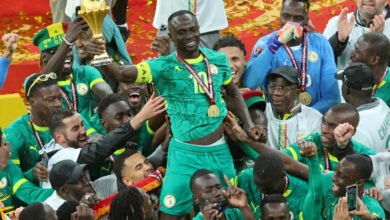 Sadio Mané leads the Senegalese celebrations after receiving the trophy