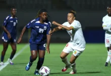 Saratou Traore of Mali comes under a challenge from Larissa Patricia and Silva Melo of Cape Verde during the match