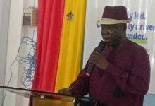 Mr Akamugri (inset) addressing participants at the programme