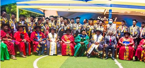 Dr Kavaarpuo (seated third from right) with Prof Malcolm (seated fifth from right) and some university authorities and graduands after the ceremony