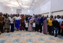 Prof. Opoku-Agyemang (seventh from right) with other dignitaries and the Ghanaian Community in Rwanda after the meeting