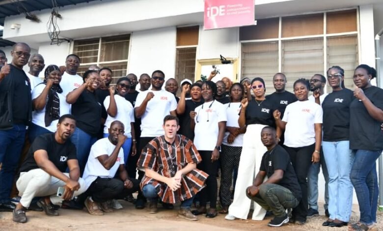 Mr. Reed Peterson in smock with the iDE staff in Tamale.