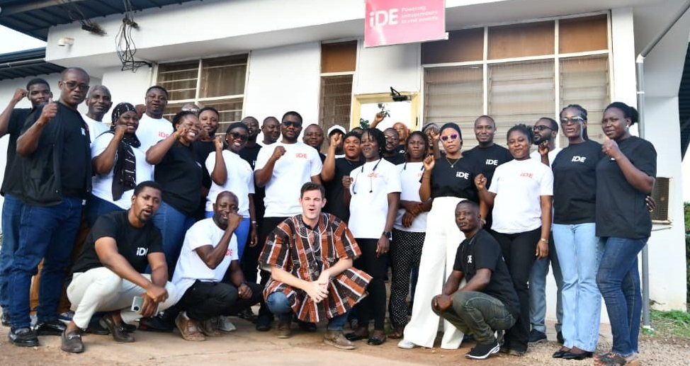 Mr. Reed Peterson in smock with the iDE staff in Tamale.