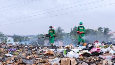Workers of Zoomlion carrying out a disinfection exercise at Accra Newtown.