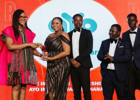 Officials of aYo Ghana receiving the awards