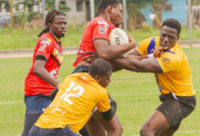 Titans duo of Nana Yaw Ofori Nyantakyi and Davies Dorm battle Bulls' Martin Buabeng for the ball