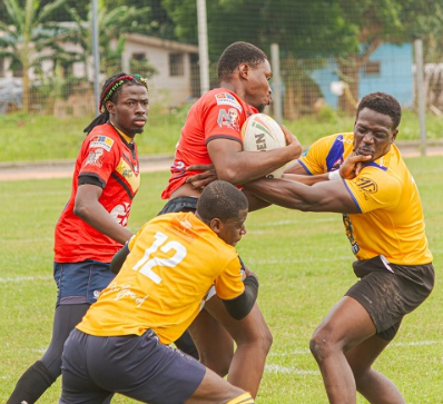 Titans duo of Nana Yaw Ofori Nyantakyi and Davies Dorm battle Bulls' Martin Buabeng for the ball