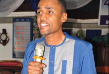 Mr Sam-Woode (inset) speaking at the programme