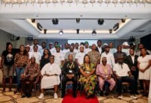 Mr Ankrah (Seated second left), Mr Deen (third left) Gideon Hammond, Deputy Director-General of the NSA (far right) together with members of RMPC and the media
