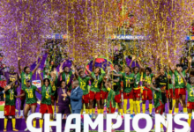 Cameroon's football team celebrates after winning the Women's AFCON 2026 final against Malawi, in Rabat