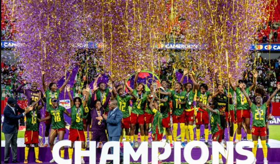 Cameroon's football team celebrates after winning the Women's AFCON 2026 final against Malawi, in Rabat