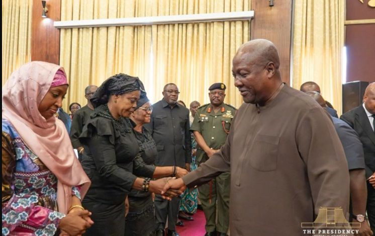 President Mahama (right) exchanging greetings with victims' relatives at Jubilee House
