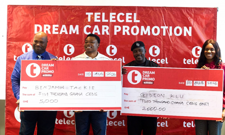 Accra-based winners, Benjamin Tackie and Gideon Klu (middle), receive their monthly cash rewards in the Telecel Dream Car Promo