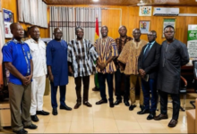 Mr Mburidiba (fourth from left) with the management of GSS after the visit