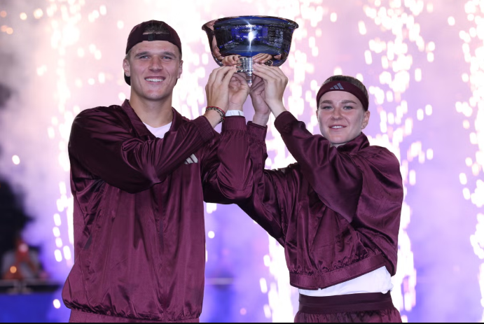 Jakub Mensik and Karolina Muchova with their trophy