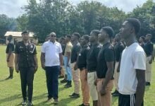 Retired DCOP Ekulu and Chief Inspector Bestman Afful inspecting the gaurd of honour at the programme