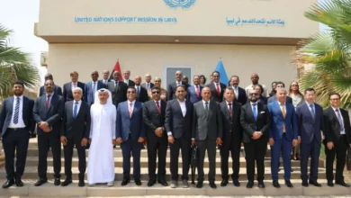 A group photo of the participating parties at the agreement signing ceremony
