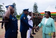 Vice President Prof. Opoku-Agyemang (right) exchanging greetings with senior military officers at the ceremony