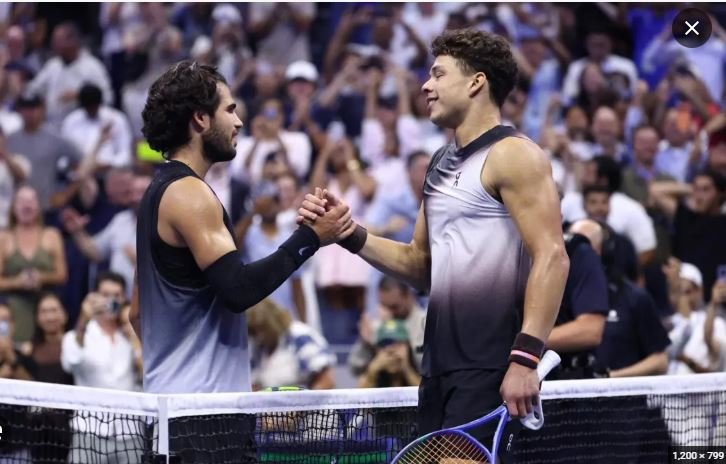 American star Shelton (right) consoles the highly rated Alcarez after their US Open semifinal showdown