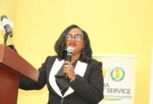 Dr Pamela Graham (inset) addressing participants at the launch. Photo. Ebo Gorman