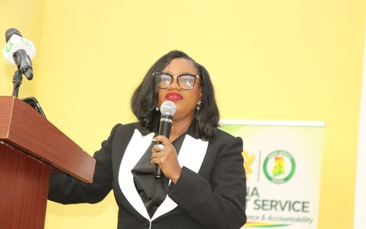 Dr Pamela Graham (inset) addressing participants at the launch. Photo. Ebo Gorman