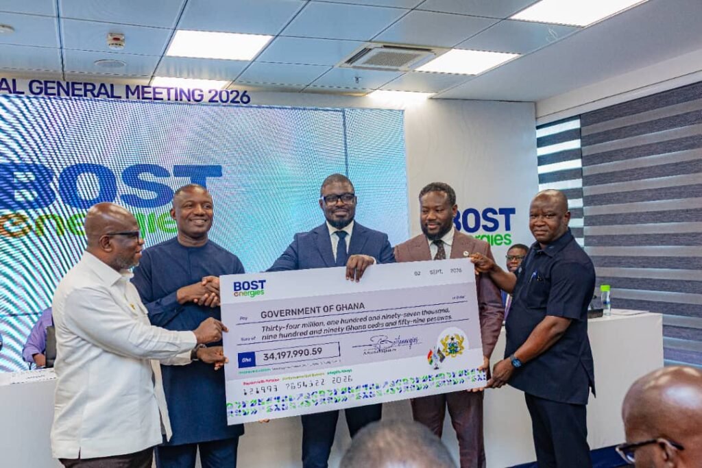 Mr Awoonor (second from right) presenting the dummy cheque to Dr Jinapor (second from left). With them are Prof Micheal Kpessa-Whyte (left) and officials from BOSTenergies