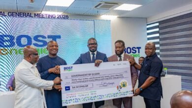 Mr Awoonor (second from right) presenting the dummy cheque to Dr Jinapor (second from left). With them are Prof Micheal Kpessa-Whyte (left) and officials from BOSTenergies