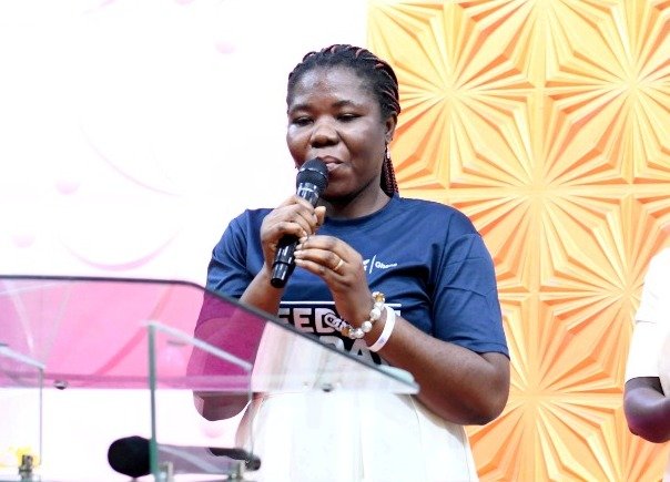 Ms Shirley (inset) addressing the congregation